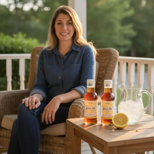 Woman on a porch with Southern Sweet Tea Co. Lemon Iced Tea bottles, a fresh pitcher of tea, and sliced lemon.